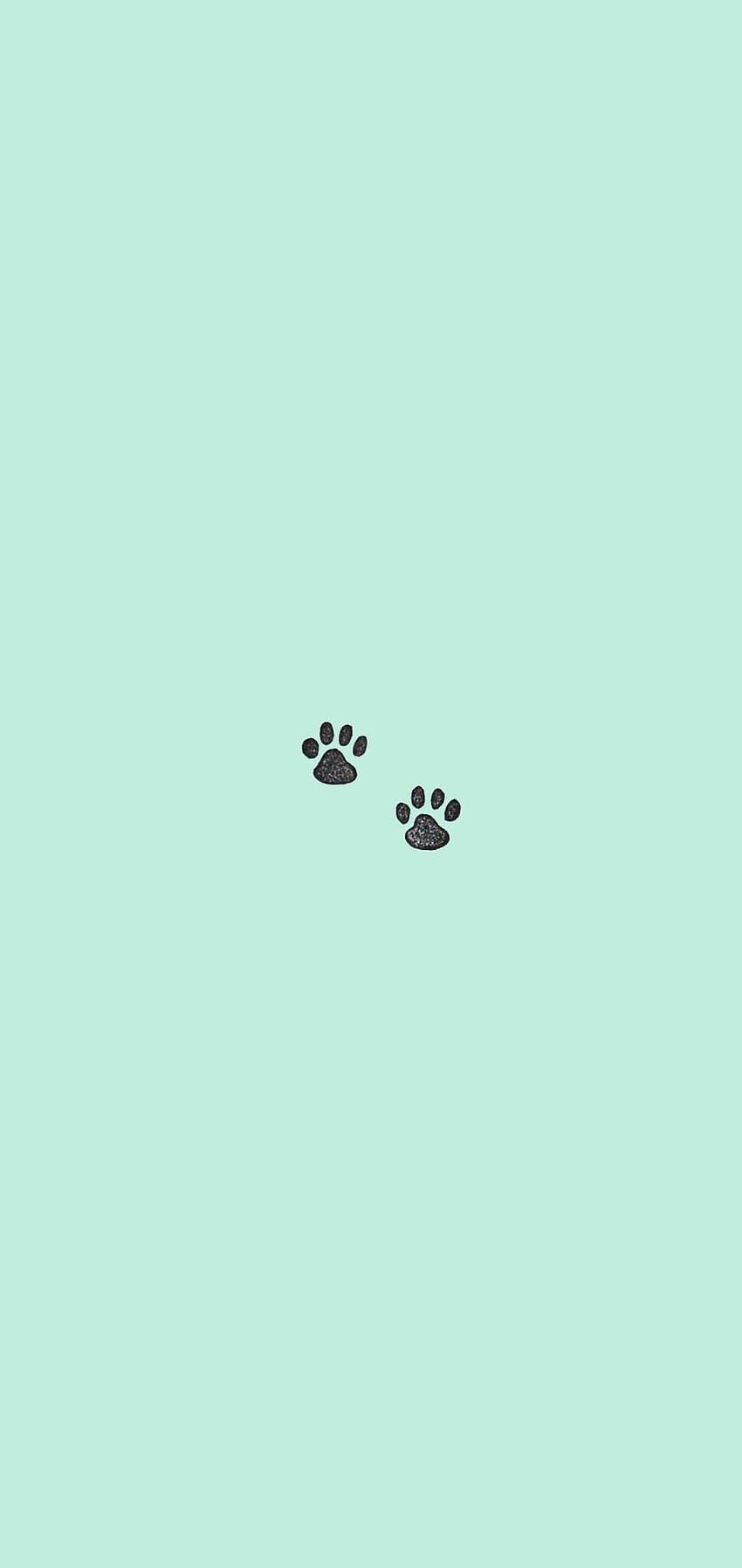 A pair of paw prints on green background - Turquoise