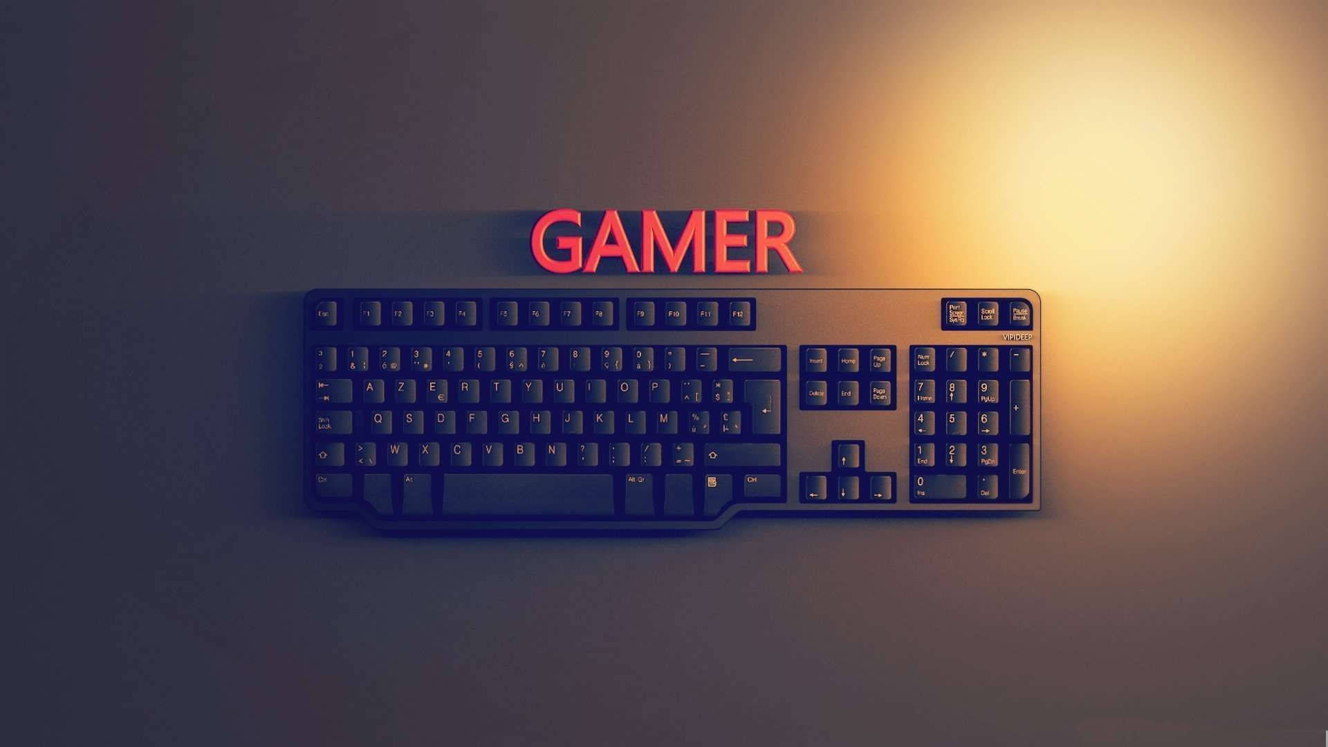 A keyboard with the word gamer on it - Gaming