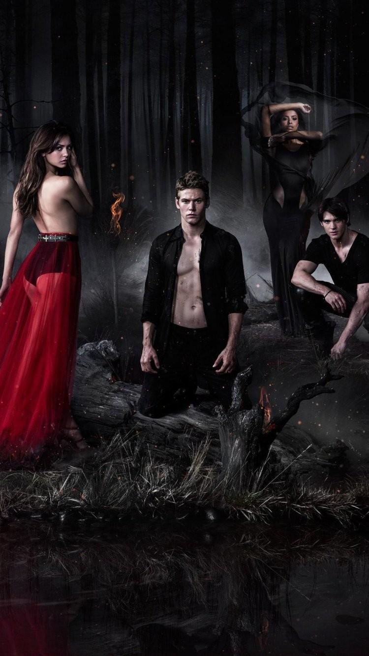 The vampire diaries cast is standing in a forest - Vampire