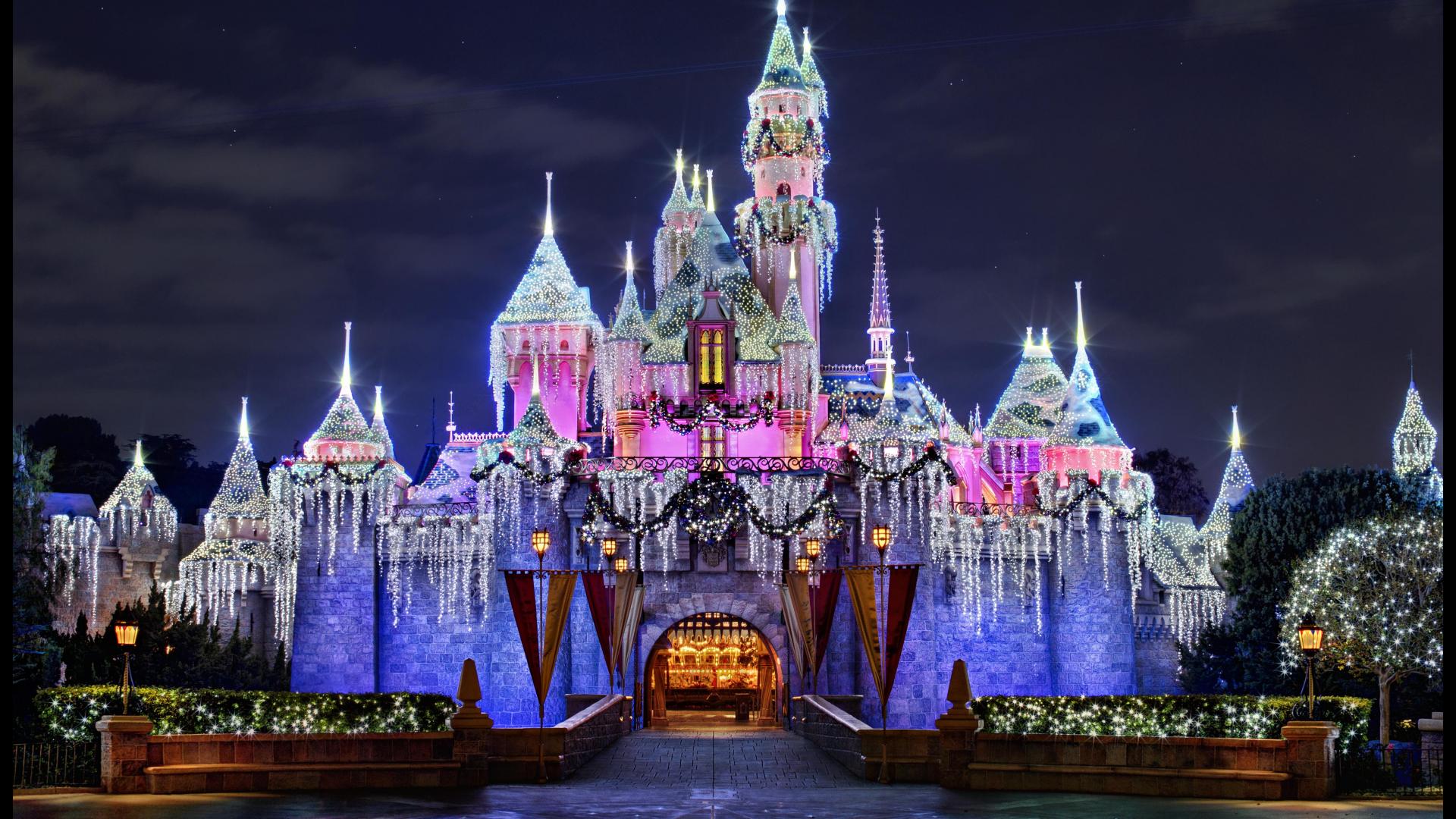 The Sleeping Beauty Castle is lit up for the holidays at Disneyland Park. - Disneyland