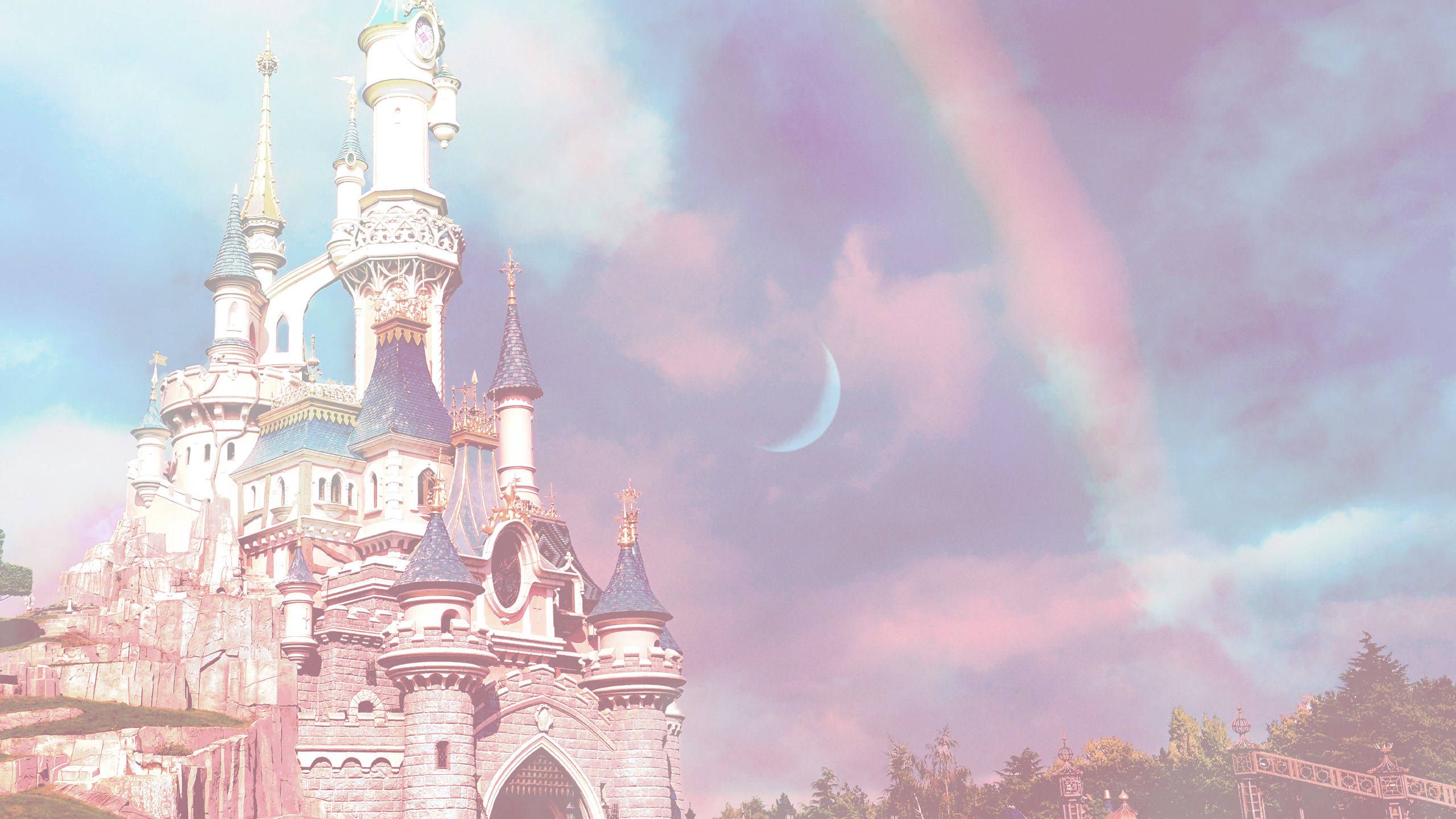 A castle with rainbow in the sky - Disneyland