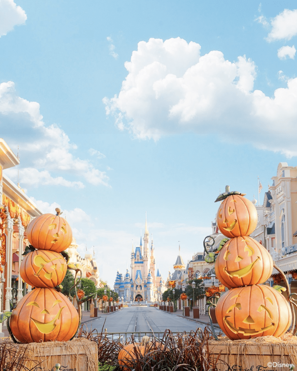 A street with pumpkins on it and buildings in the background - Disneyland