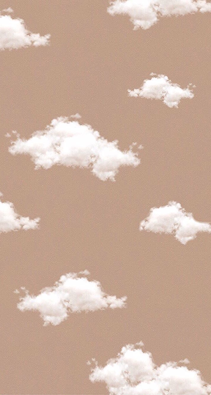 A pattern of clouds on an orange background - Light brown