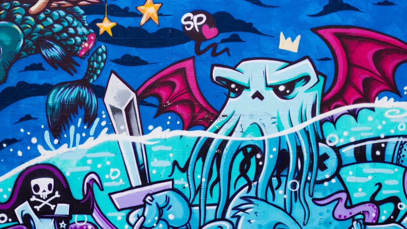 A large mural of an octopus, pirate and other characters - Graffiti