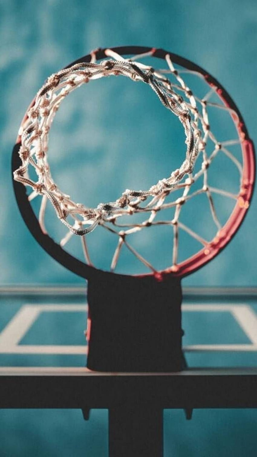 A basketball hoop with the net hanging down - Basketball