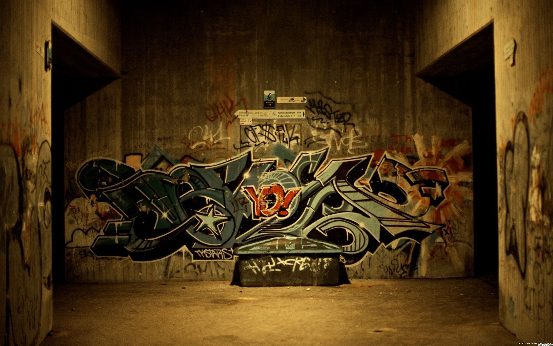 A dark tunnel with graffiti on the walls - Graffiti