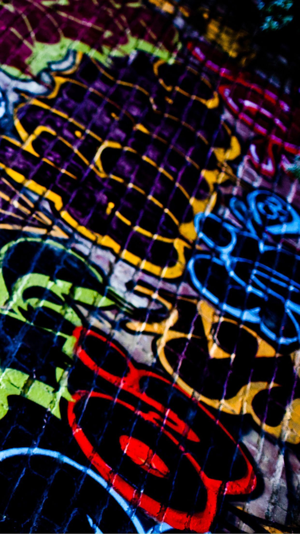 A close up of graffiti on the sidewalk - Graffiti