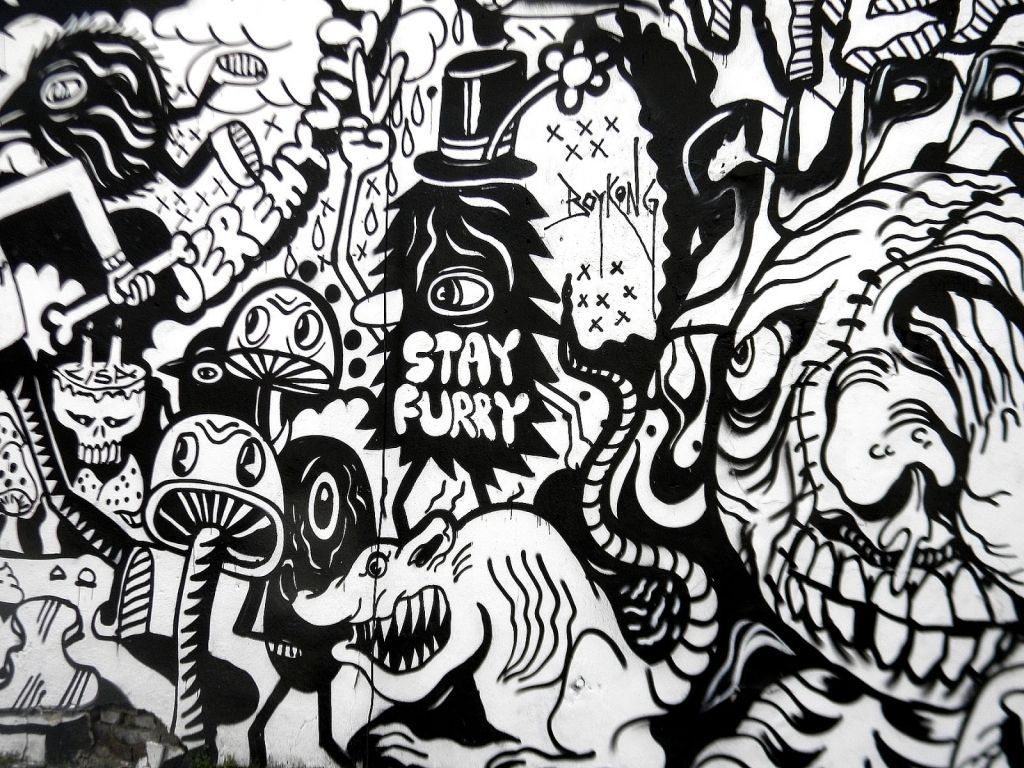 A black and white drawing of many different things - Graffiti