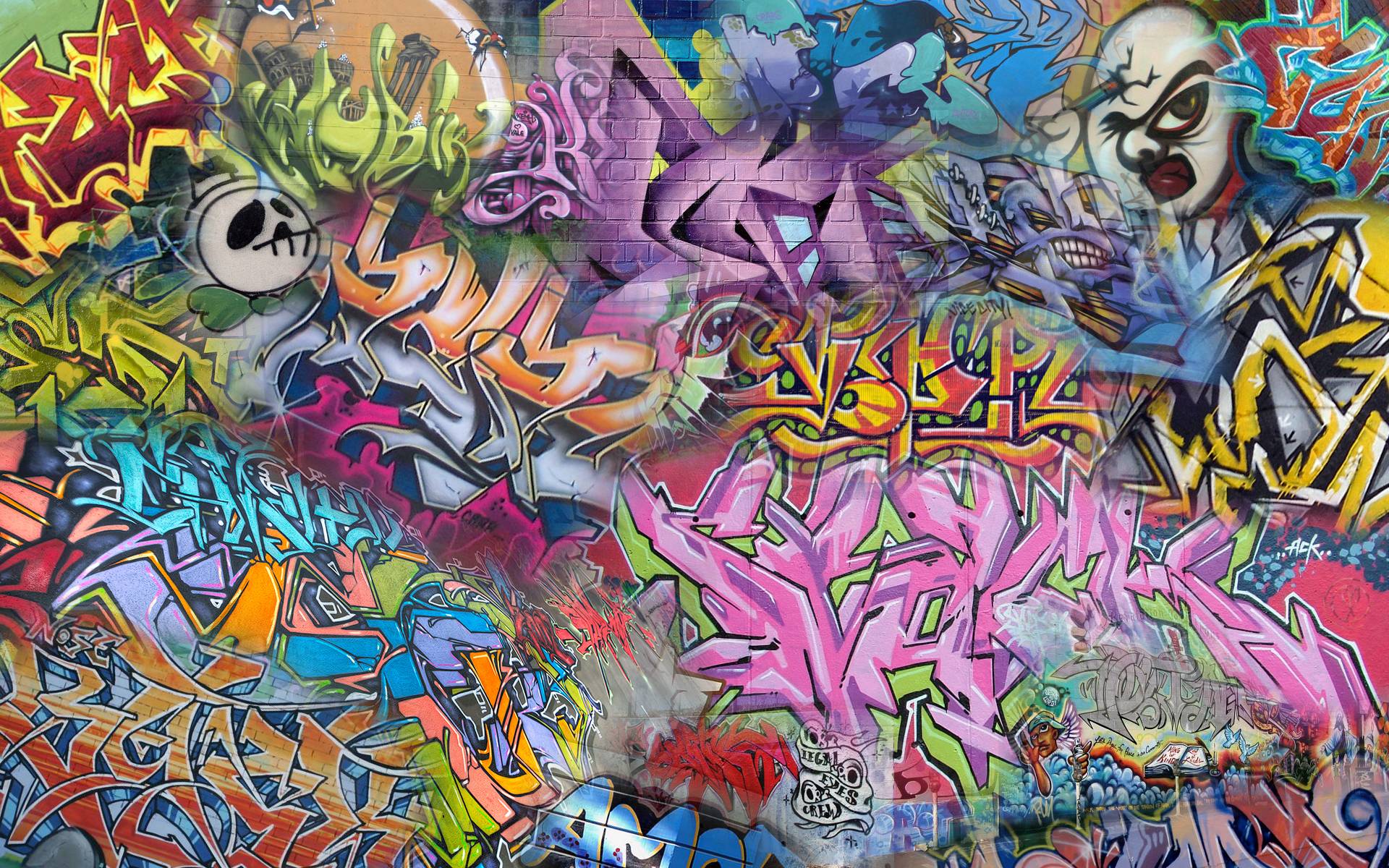 A wall of graffiti with many different colors - Graffiti