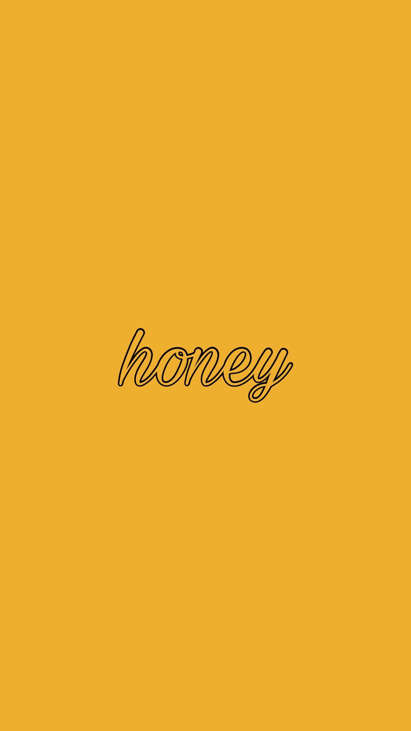 The honey logo on a yellow background - Honey