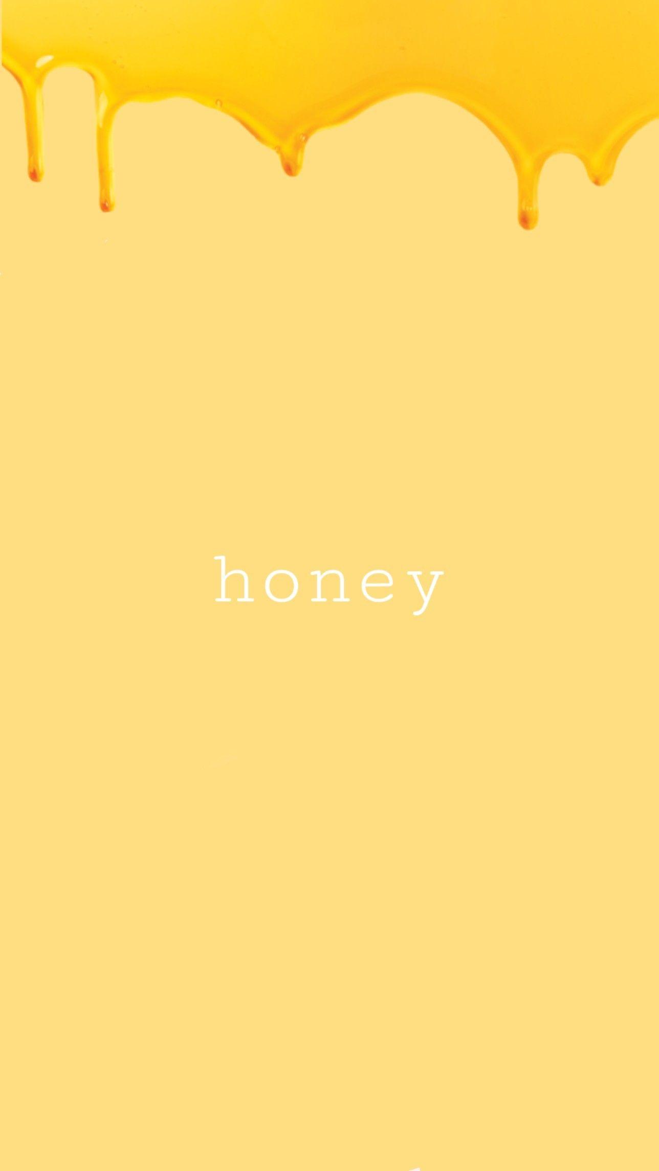 A vertical phone wallpaper with a honey drip design and the word 