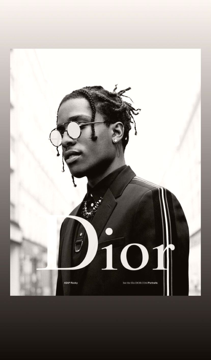 A man in sunglasses and suit on the cover of dior - Dior