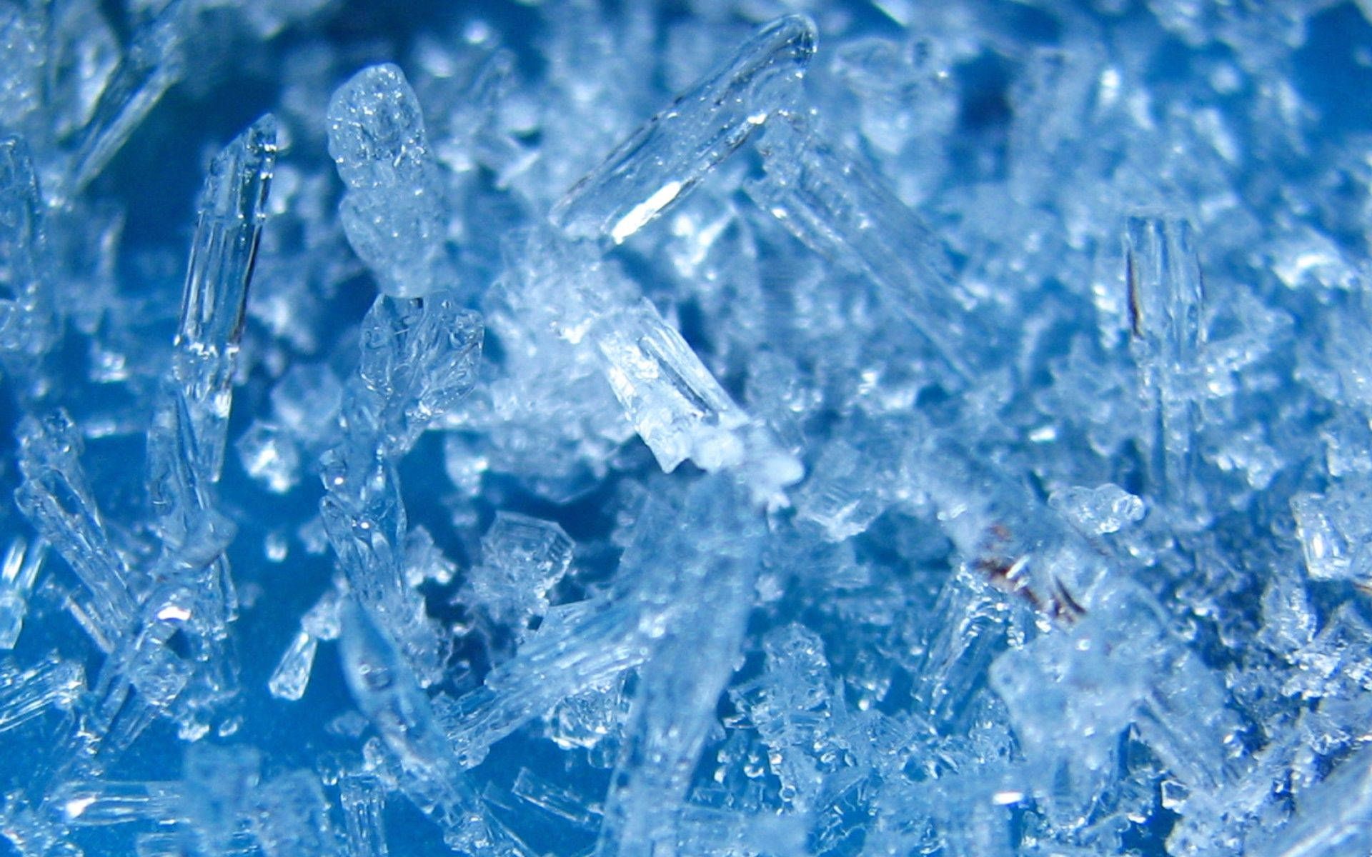 A close up of ice crystals in water - Ice