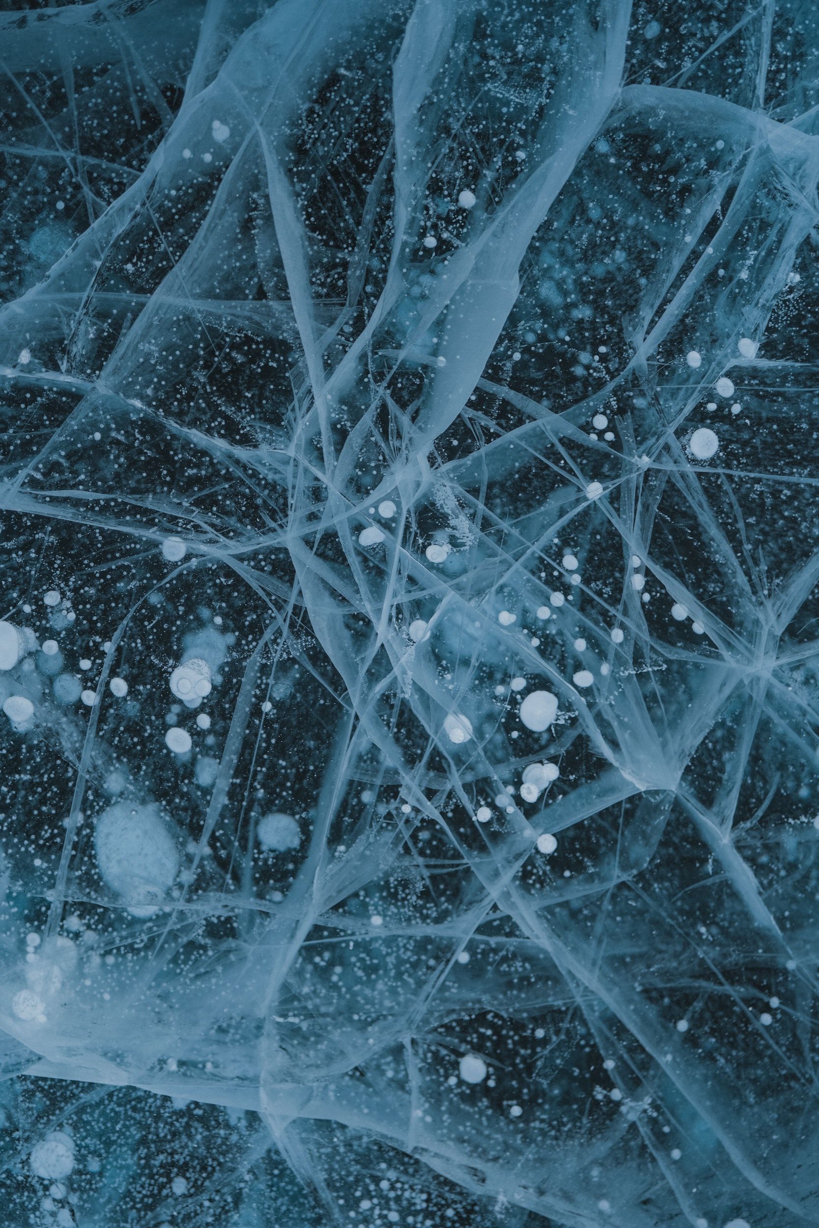 A close up of ice formations on a frozen lake - Ice