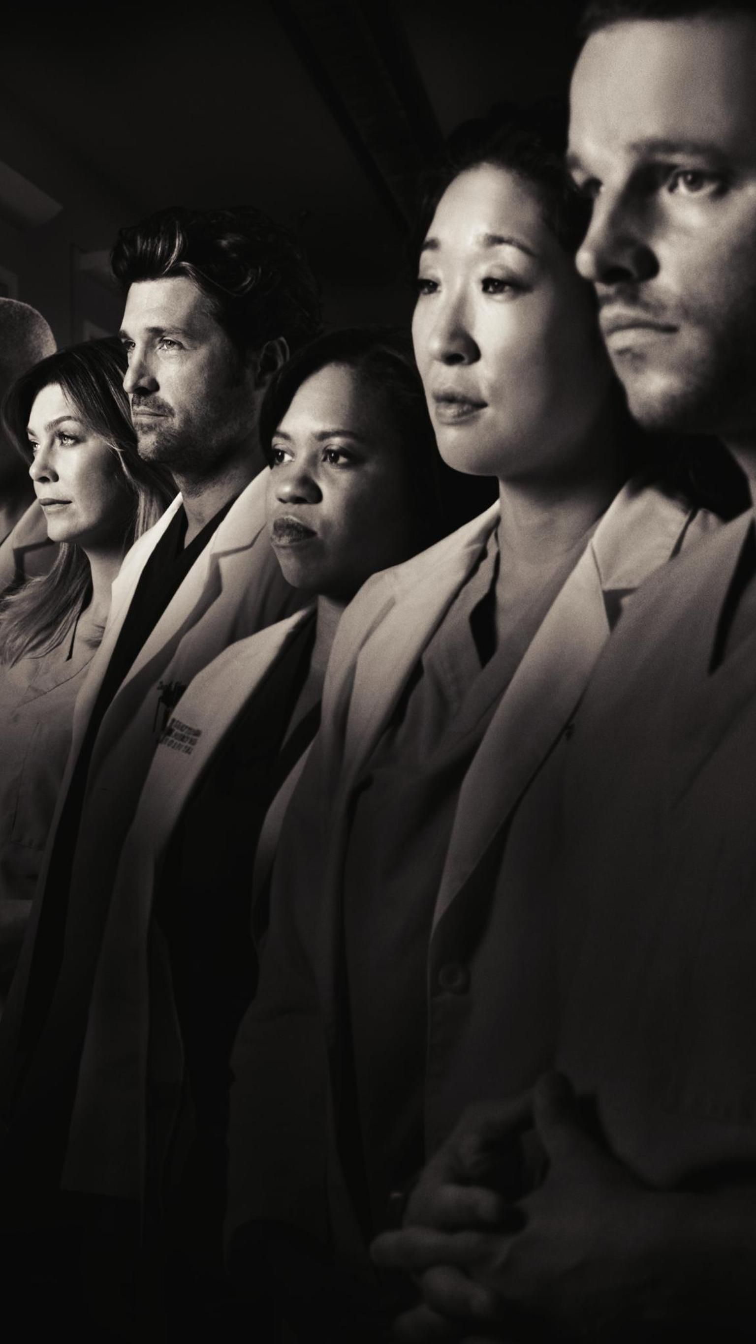 A group of people standing in front - Grey's Anatomy
