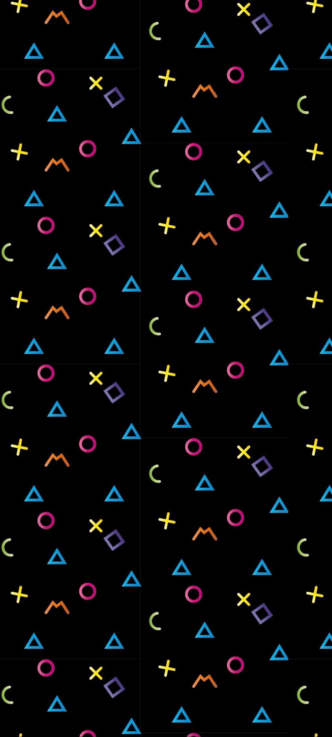 A pattern of different colored shapes on black - Math