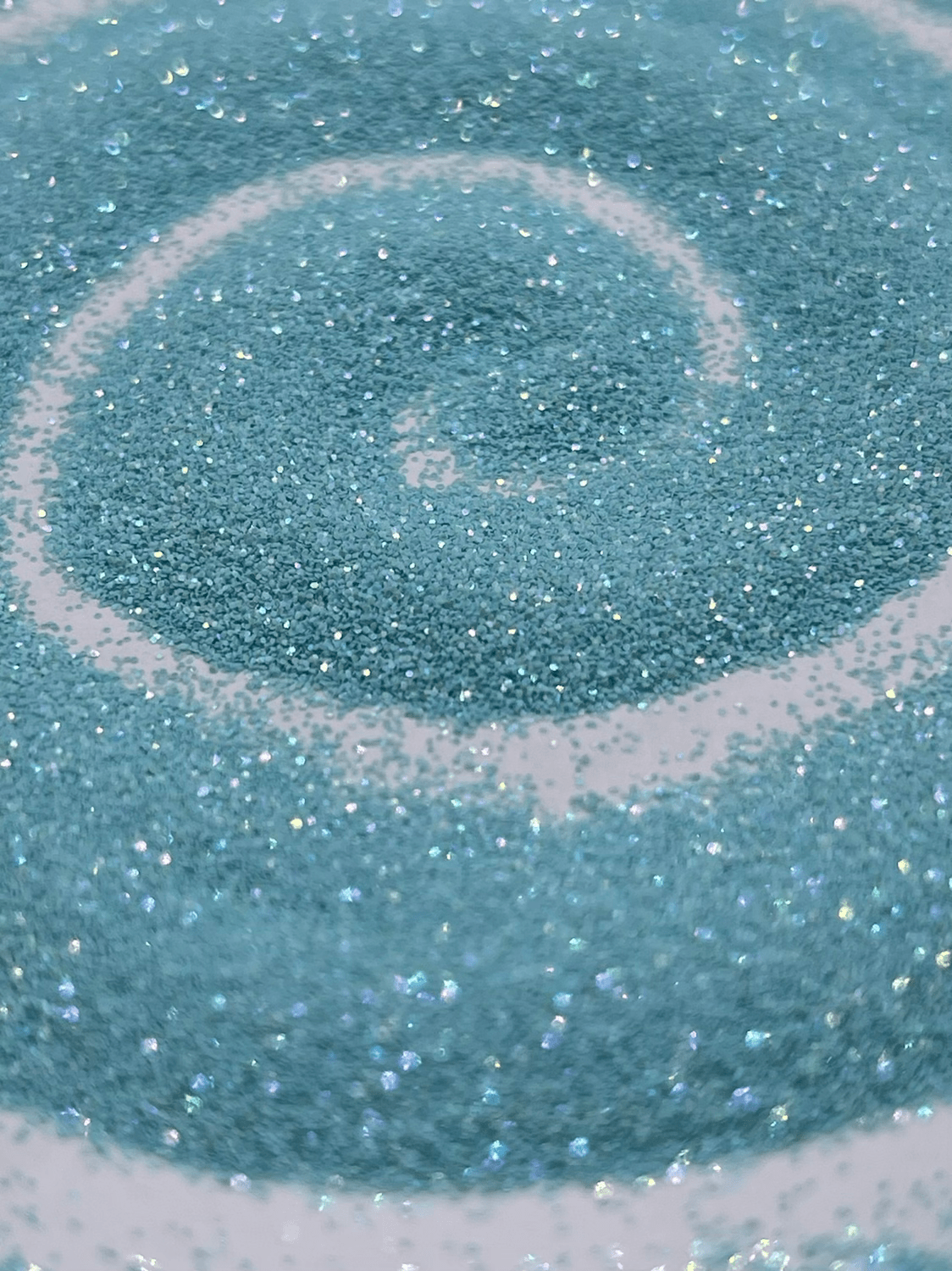 A close up of some blue glitter - Bling