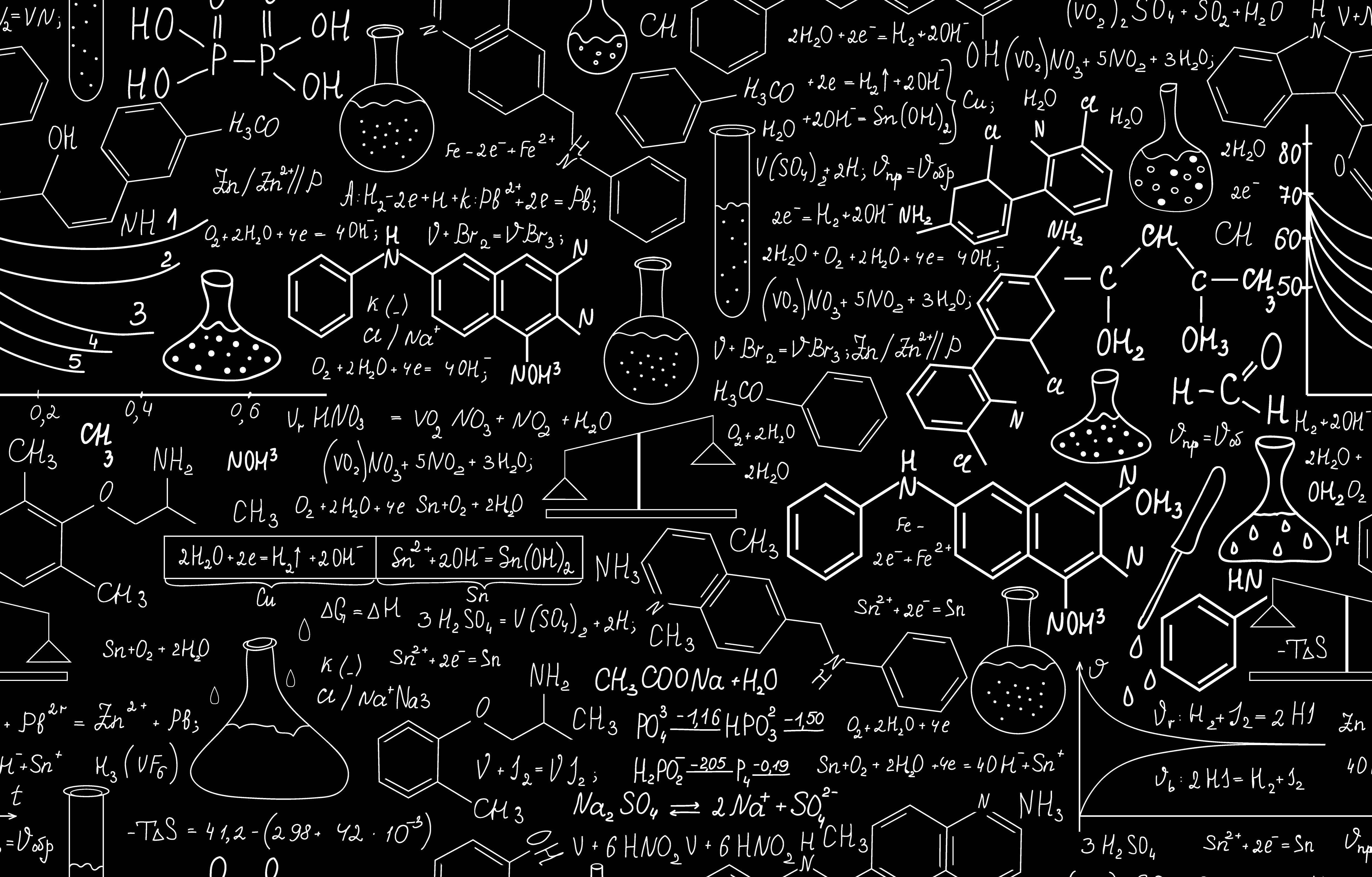 A blackboard with scientific symbols and equations - Chemistry