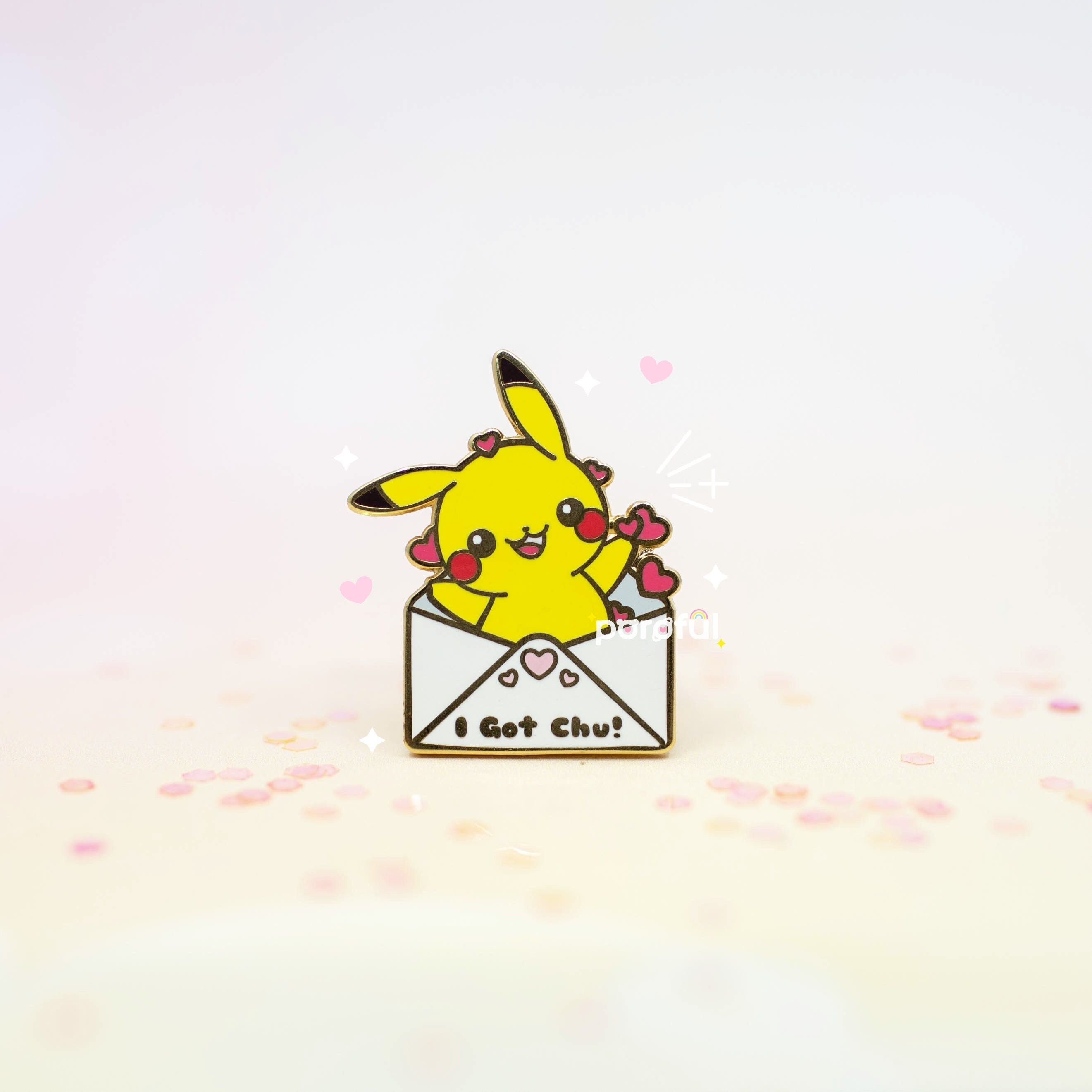 A cute Pikachu enamel pin with a love letter that says 