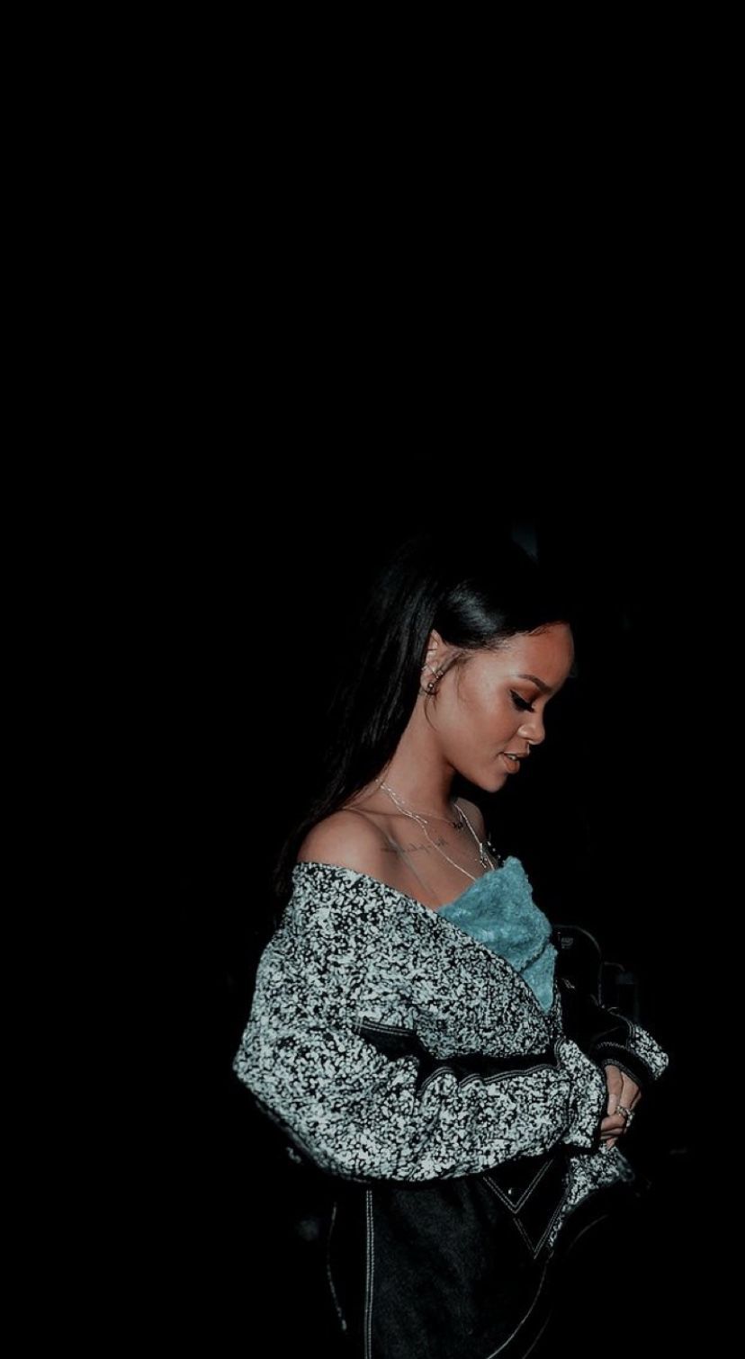 IPhone wallpaper of Rihanna in a black and white top with a blue bralette - Rihanna