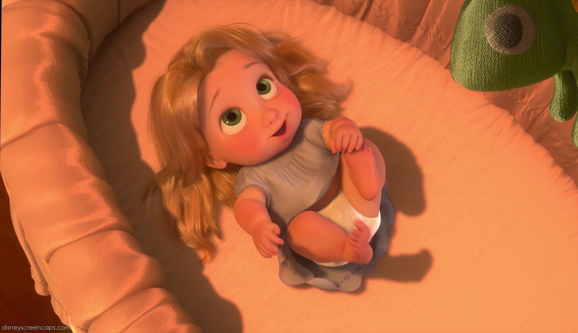 A baby is laying in her crib - Rapunzel