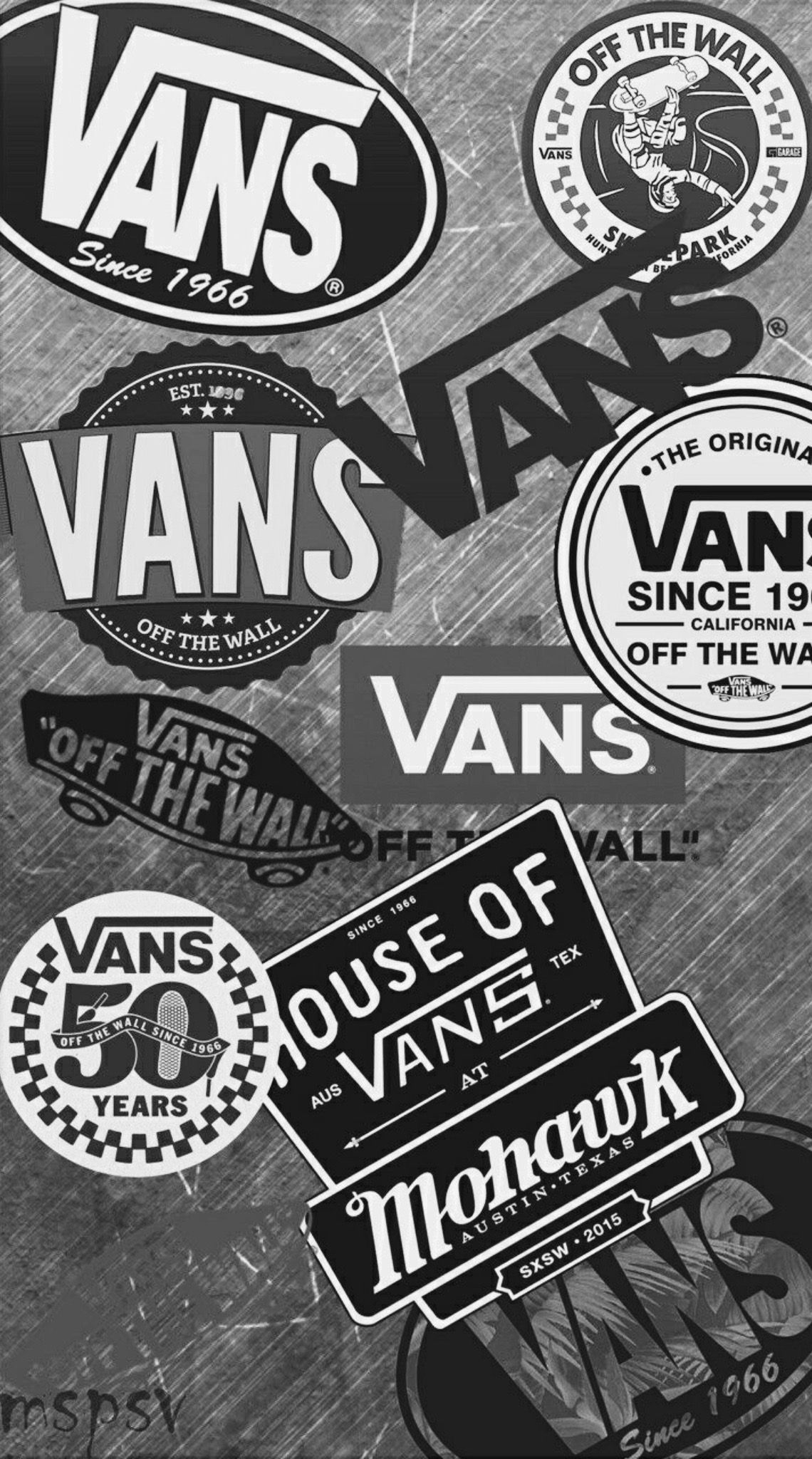 Vans skateboard stickers on a wall - Vans