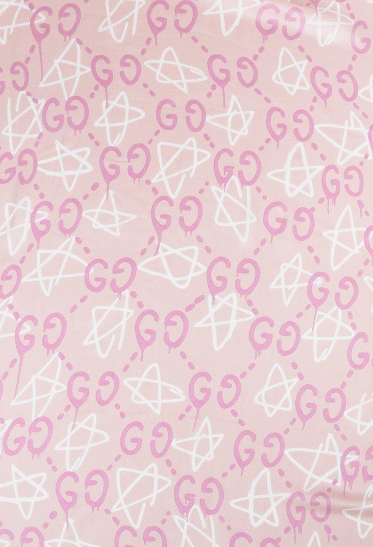 A pink and white patterned fabric - Gucci