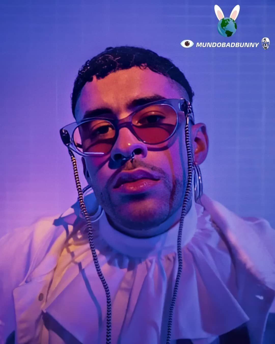 A man with a nose ring and glasses - Bad Bunny