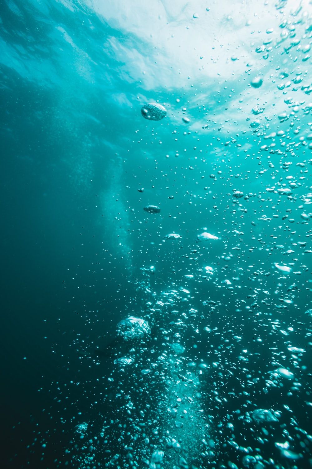 A large body of water with bubbles - Underwater