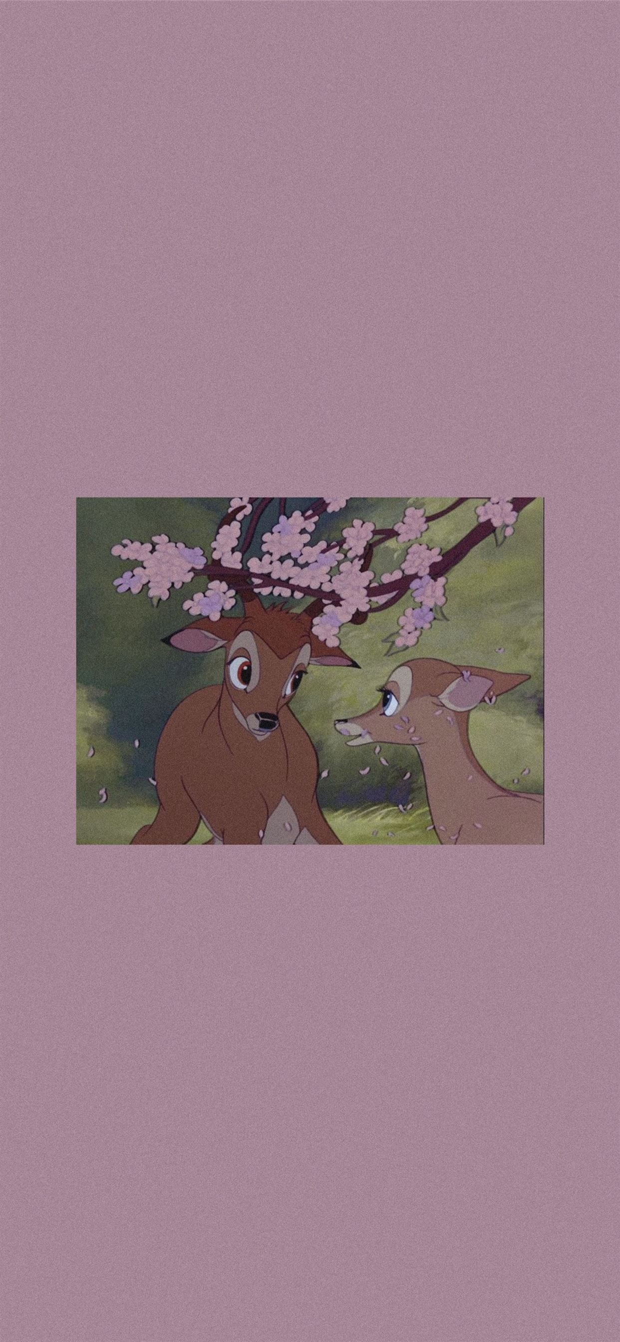 A cartoon of two deer with flowers - Tinkerbell