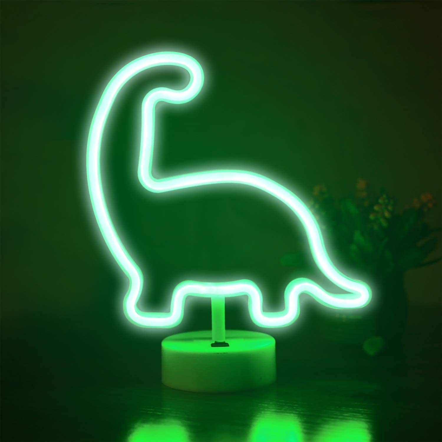 A green dinosaur neon light on a table - Neon green