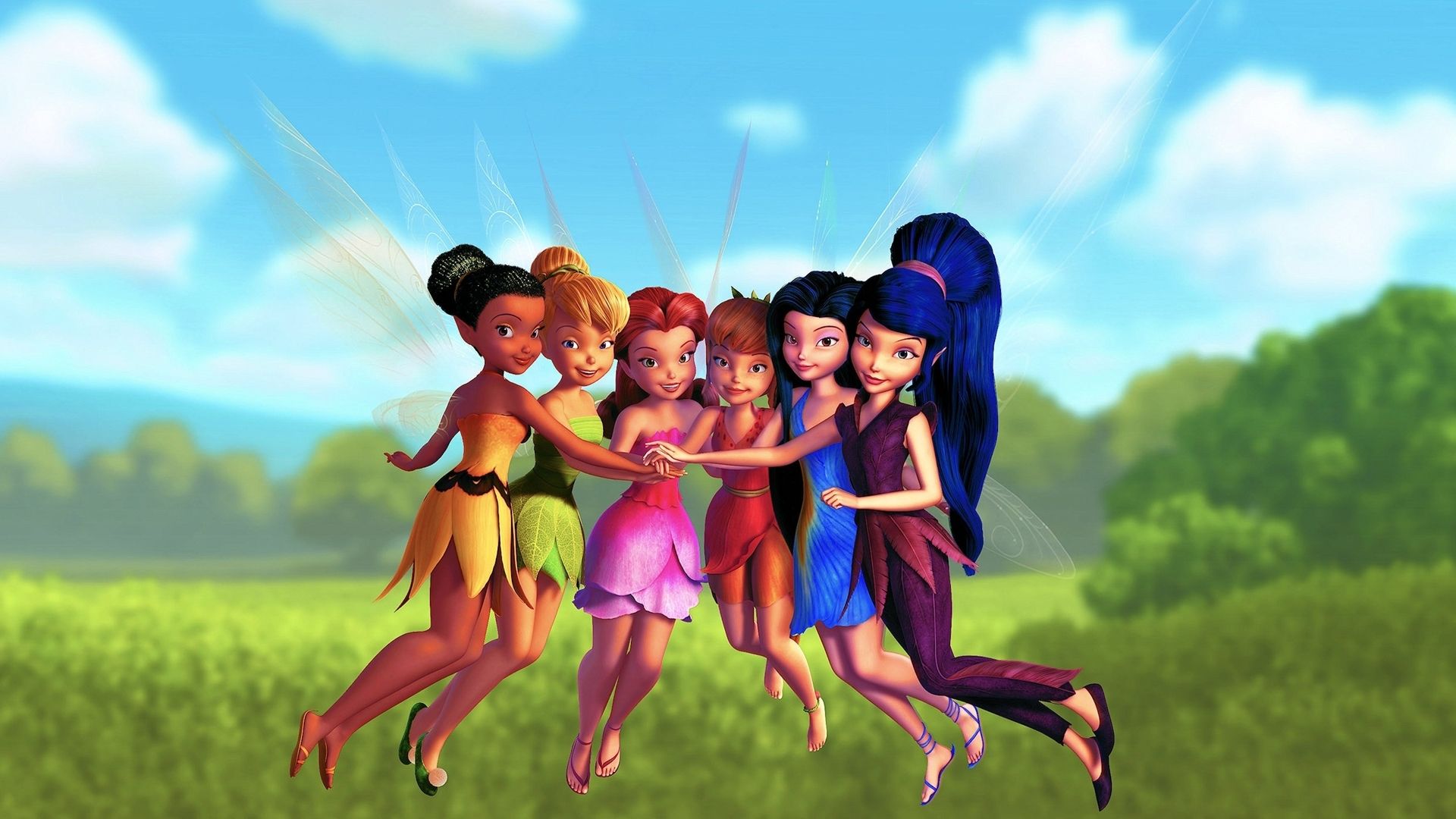 A group of cartoon fairies in the grass - Tinkerbell