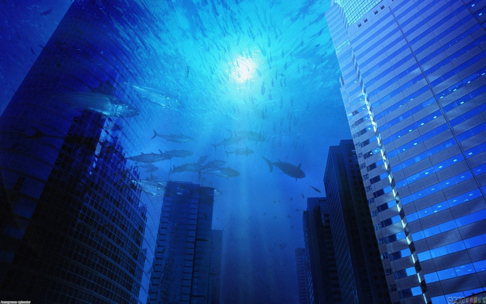 A city with tall buildings and fish swimming in the water - Underwater