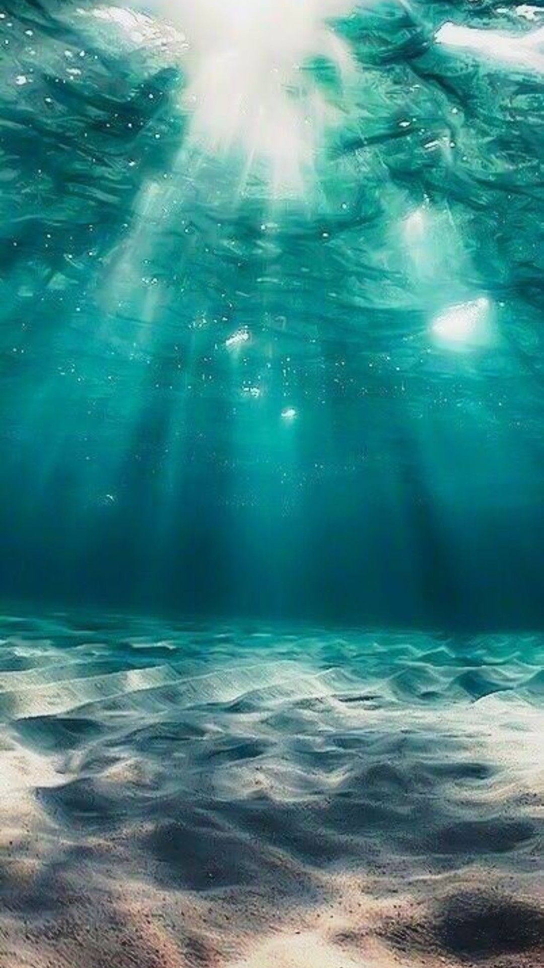 The sun's rays shining through the water wallpaper 1080x1920 - Underwater