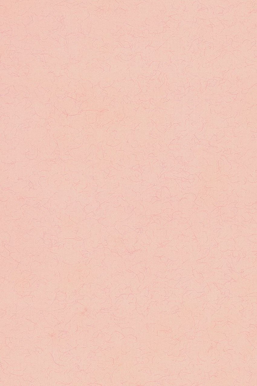 A sheet of hand made paper with a pink color and small design - Salmon