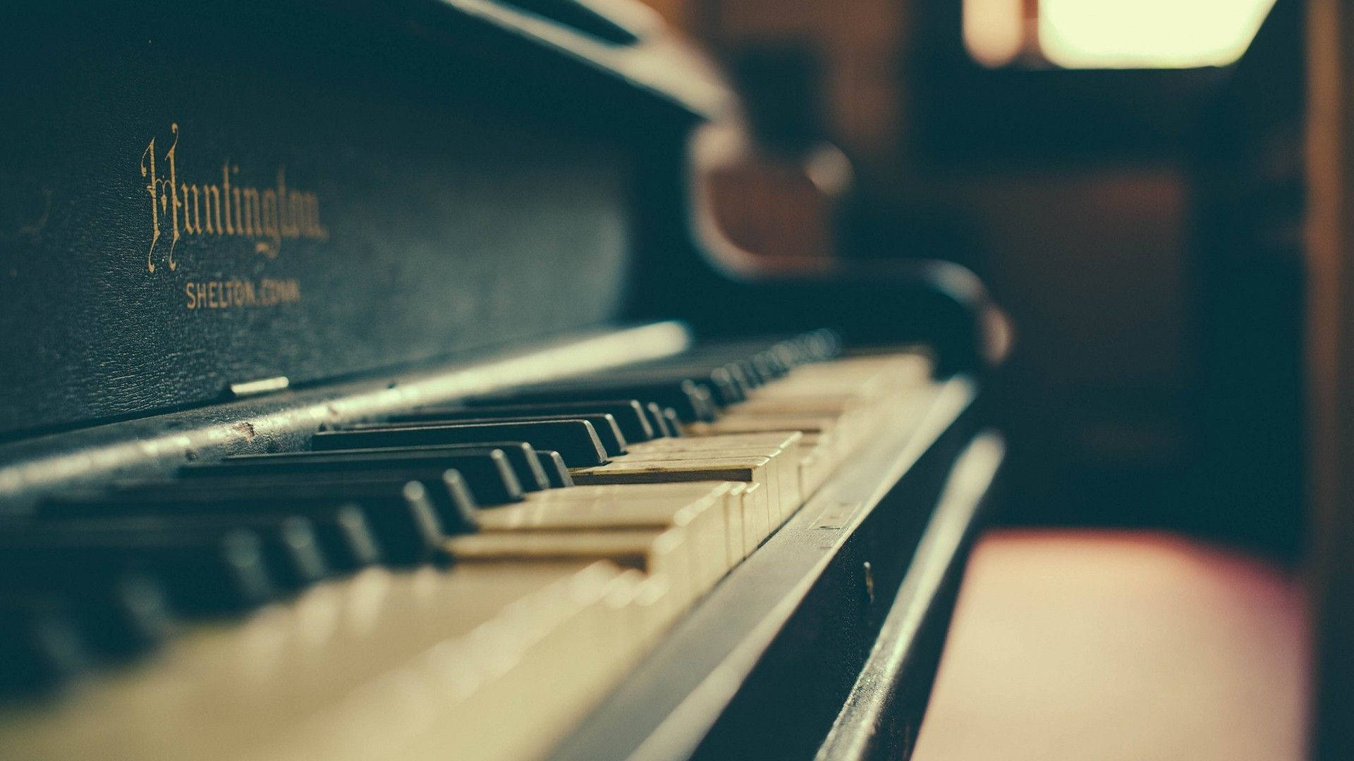 A close up of an old piano - Piano