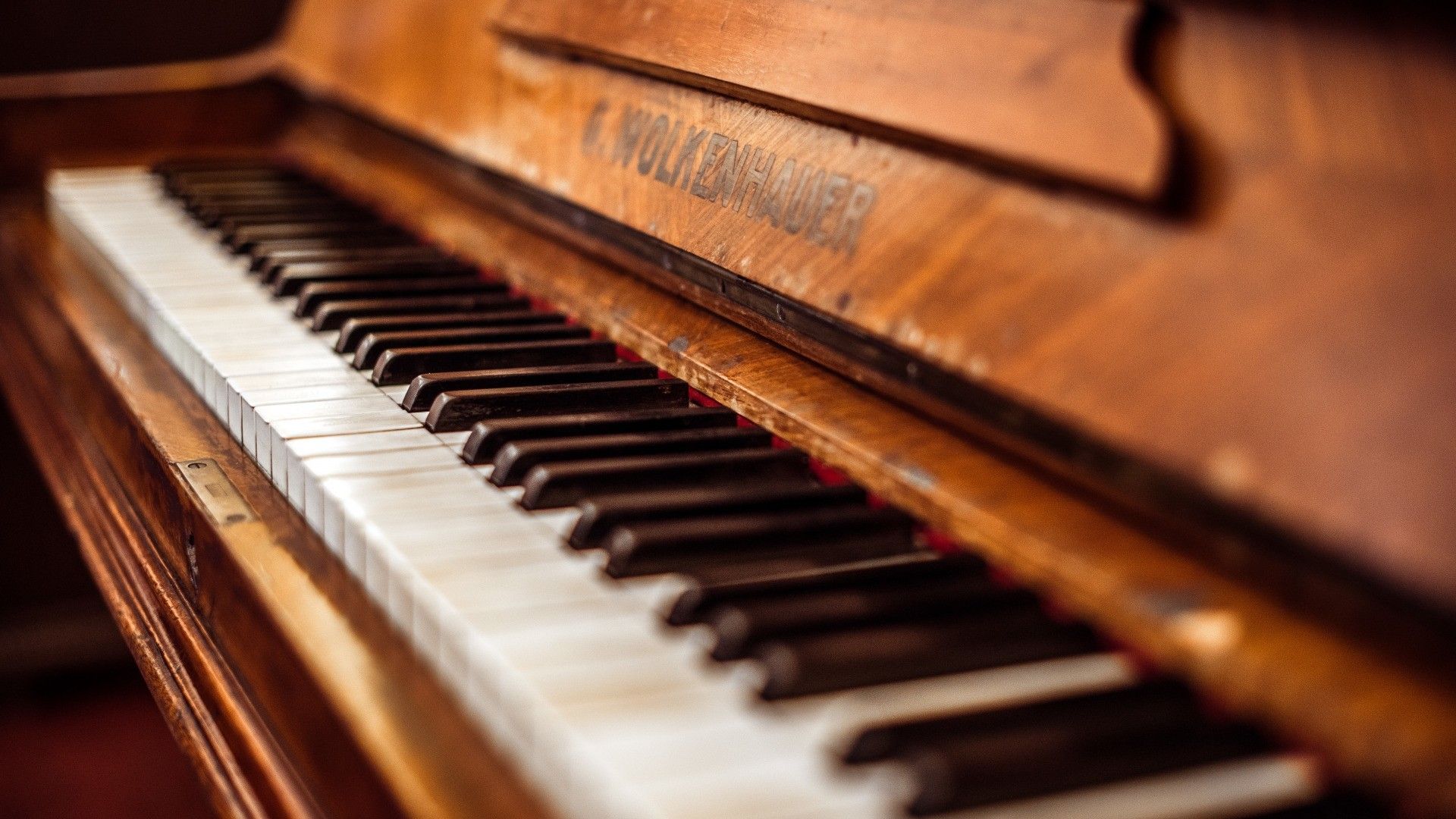 A close up of an old piano - Piano