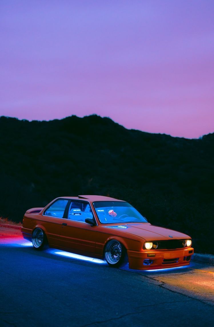 A car that is parked on the side of road - BMW