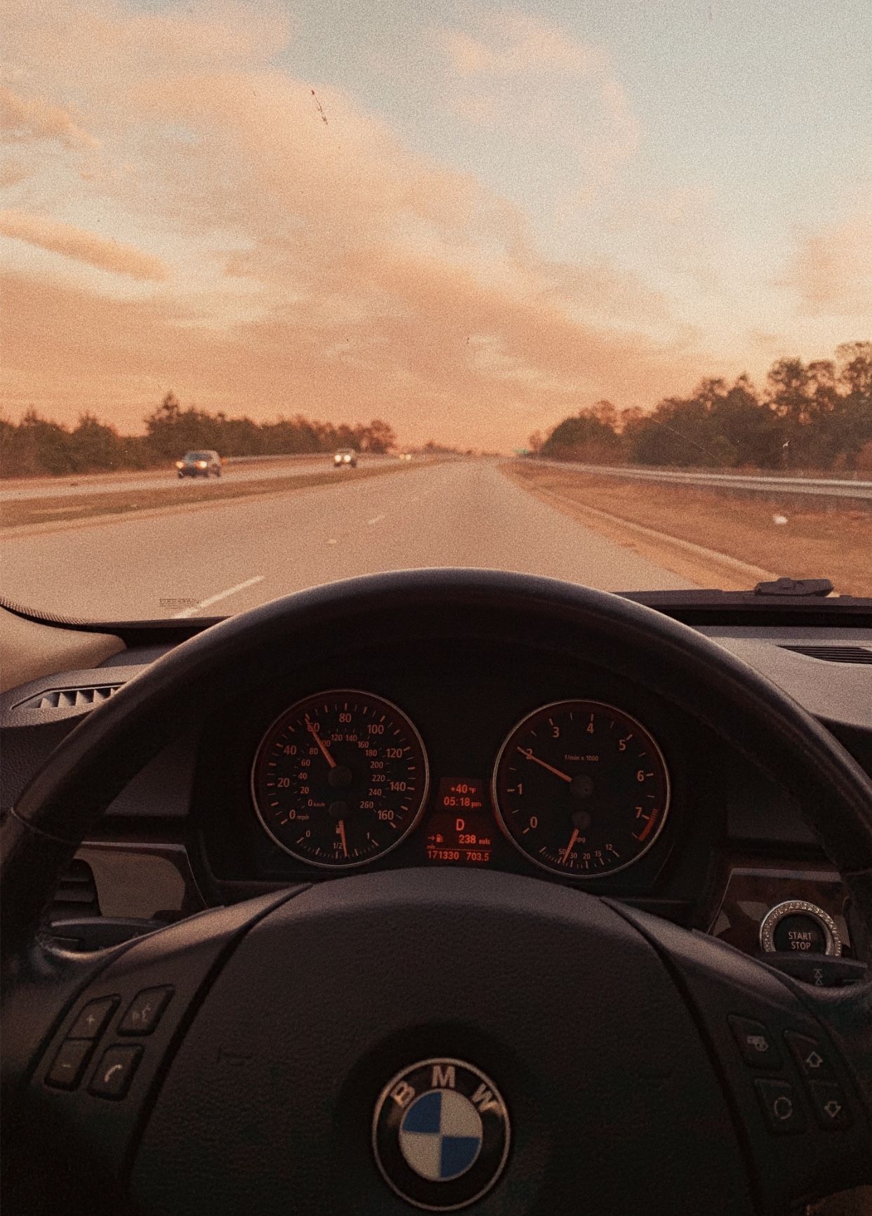 Dashboard of a car with the view of the road - BMW