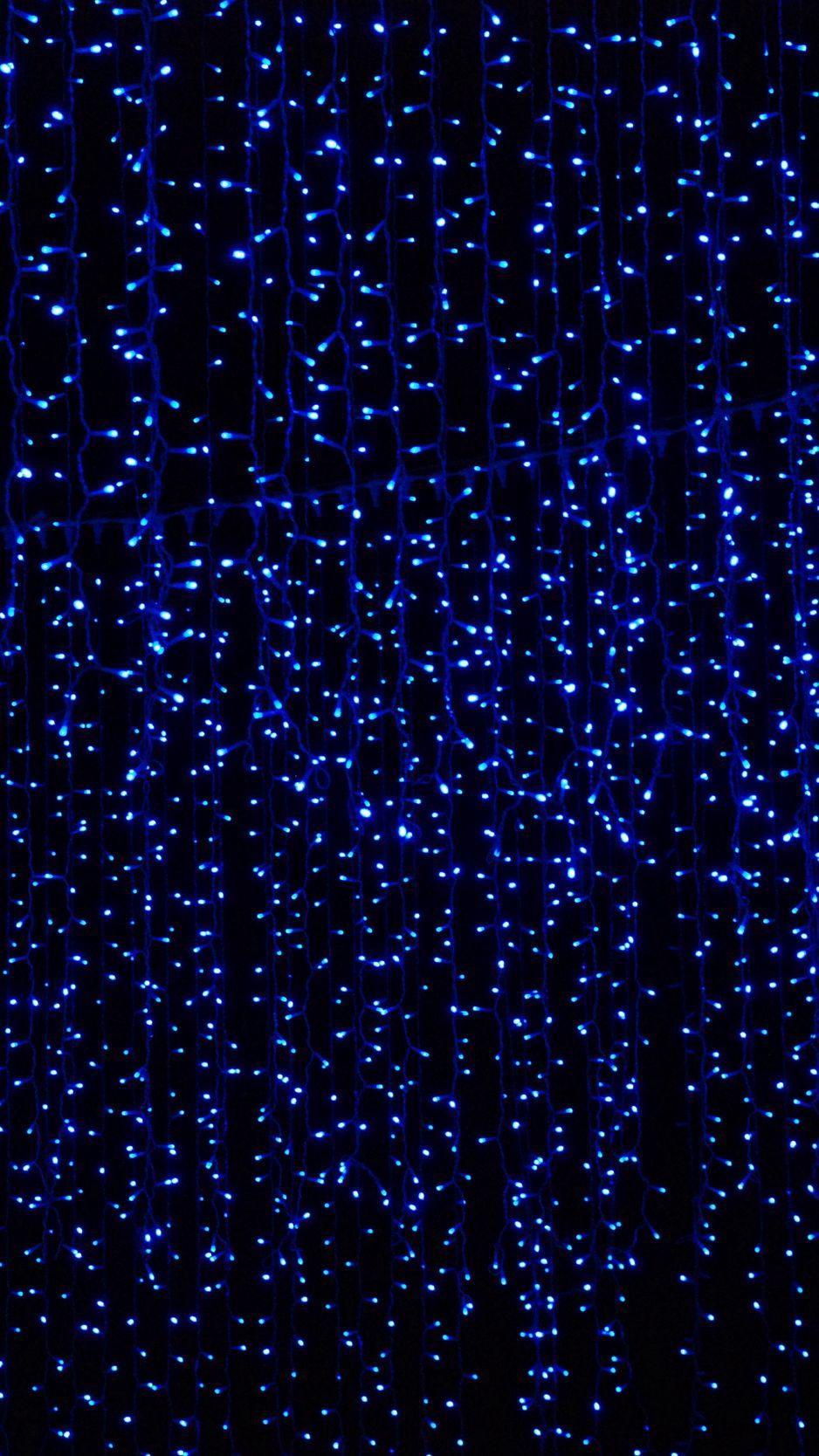 Blue led lights on a black background - Neon blue