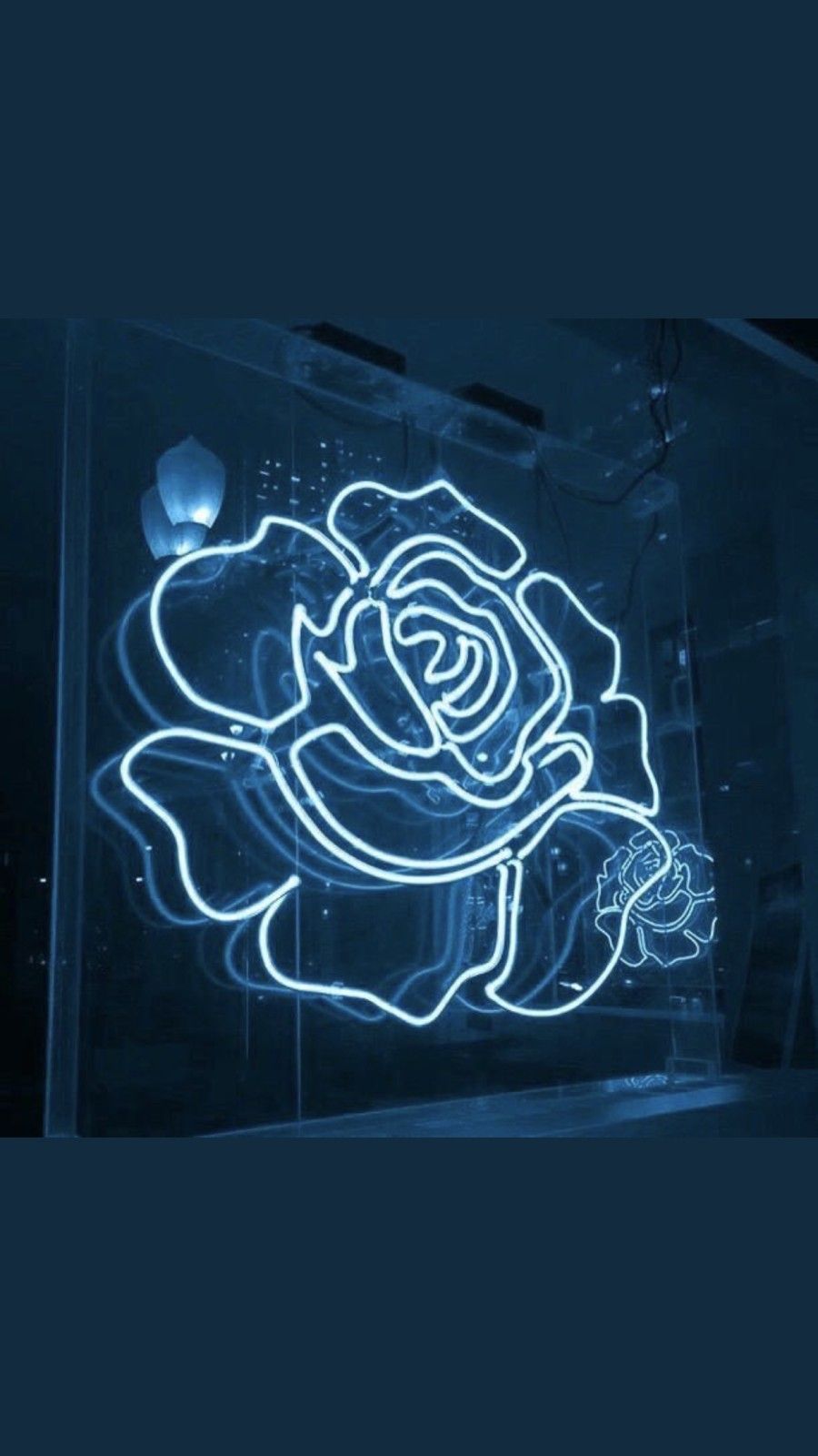 A neon sign of a rose - Neon blue