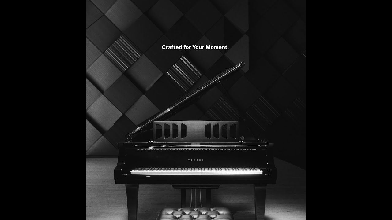 A black and white ad for the piano - Piano