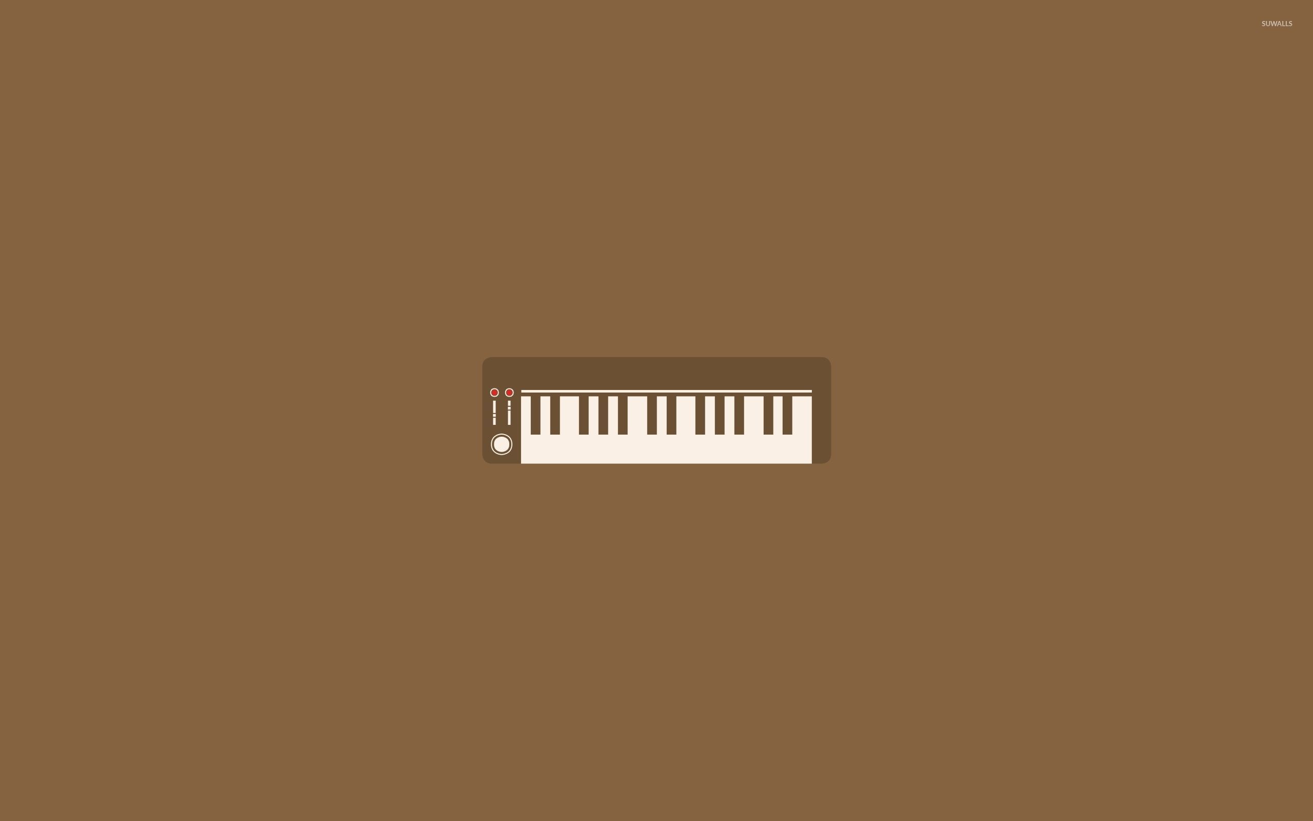 The piano keyboard on a brown background - Piano