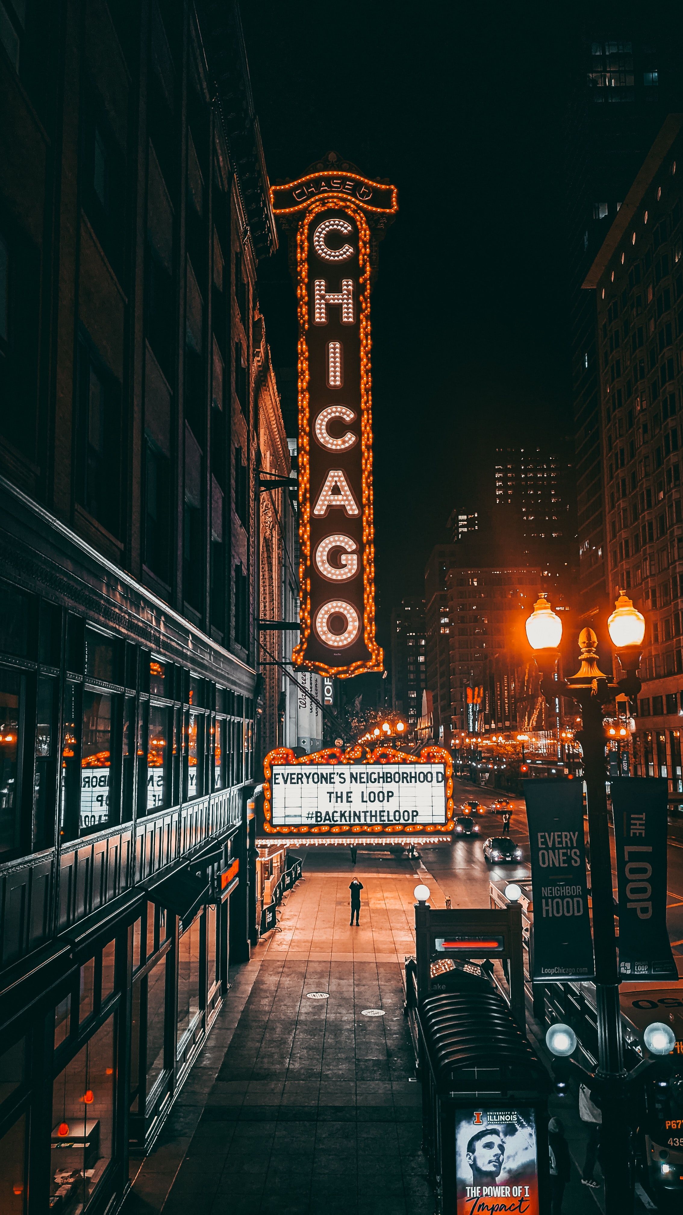 A street with many lights and buildings - Chicago