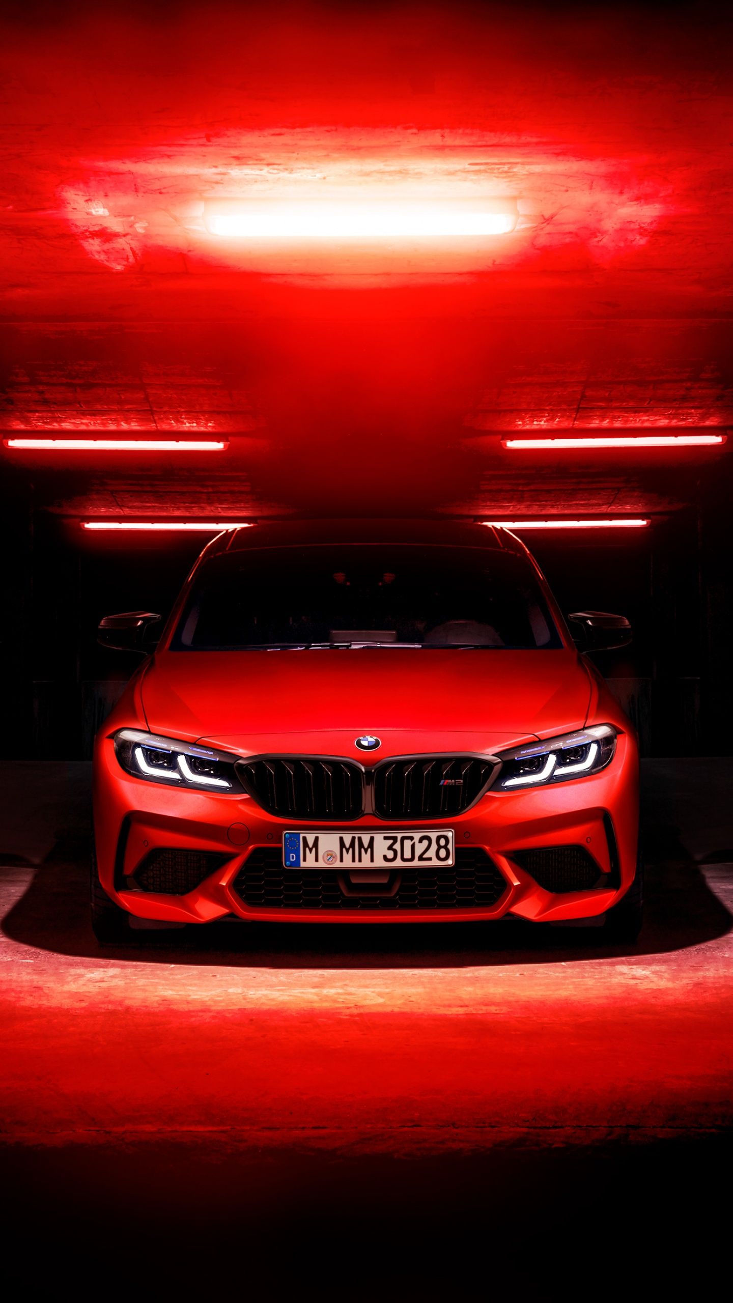 A red car is in the dark - BMW