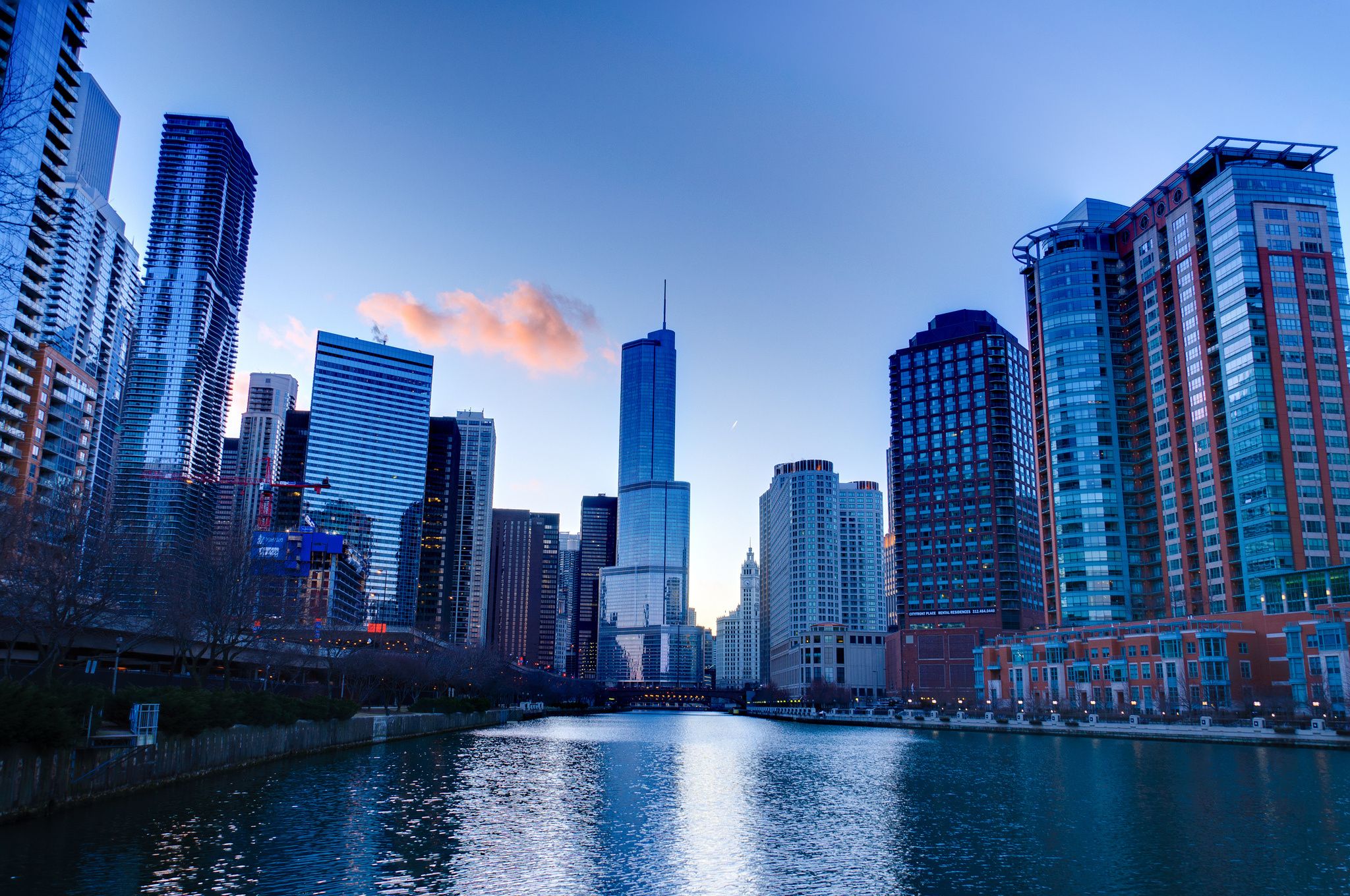 A city with tall buildings and water - Chicago