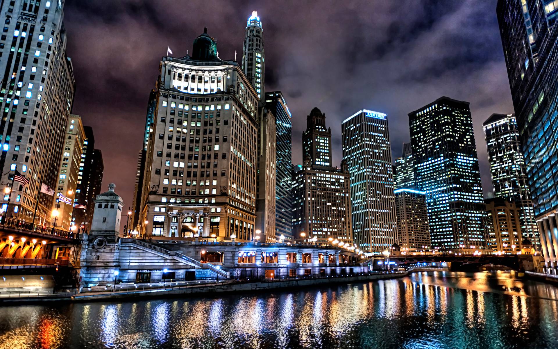 A city at night with many tall buildings - Chicago