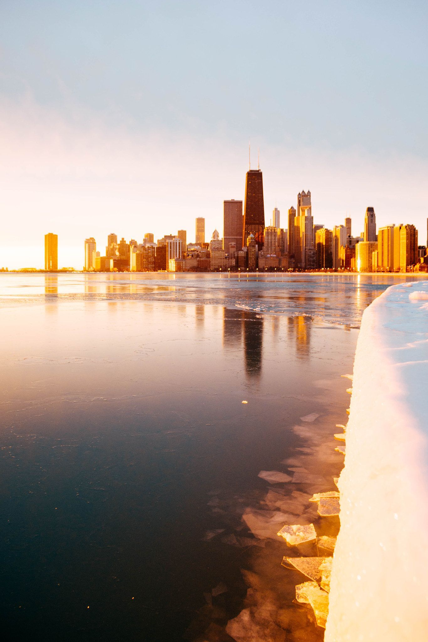 A beautiful photo of the Chicago skyline during winter. - Chicago