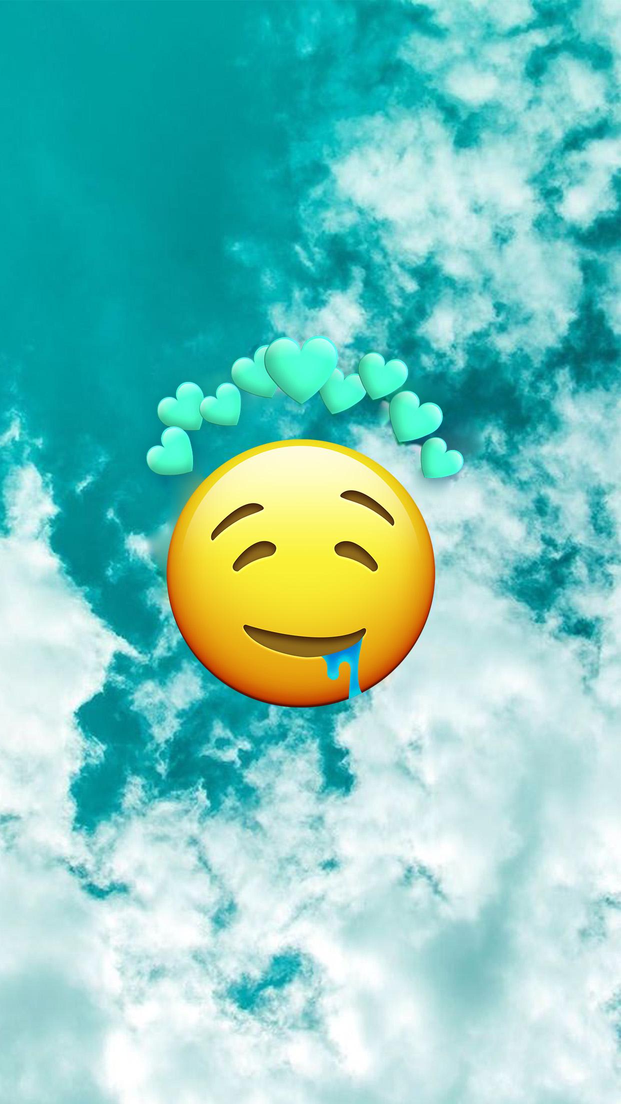 A smiling face emoji with hearts above it - Emoji