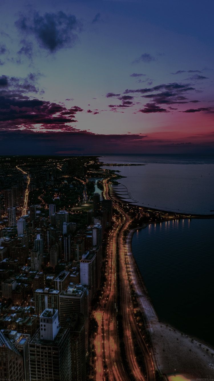 IPhone wallpaper of a cityscape at night with a purple and blue sky - Chicago